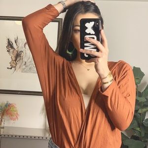 planet blue burnt orange surplice bodysuit